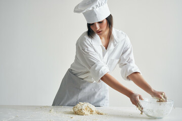 Wall Mural - cook baker rolling dough cooking pastry work