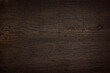 Rustic dark brown wood surface. Top view. Horizontal texture background with space for text.