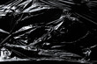 Photo of the polyethylene surface on black background