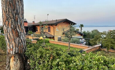 water of lake garda in italy surrounded by mountains