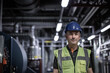 © ReeldealHD images - Portrait of male engineer working in an industrial plant room