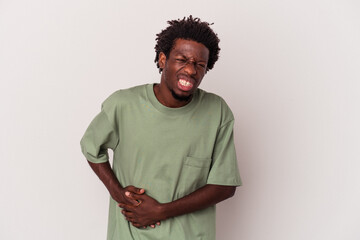 Wall Mural - Young african american man isolated on white background  having a liver pain, stomach ache.