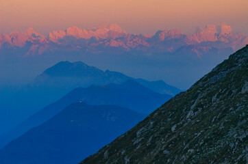 Poster - Pink Dolomites mountains illuminated by the first rays of morning sun.