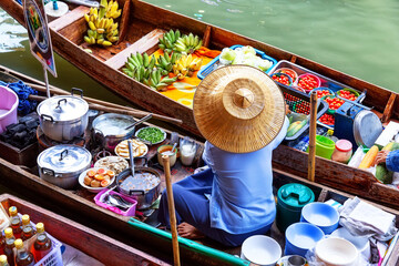 Traditional floating market in Damnoen Saduak near Bangkok. Thailand