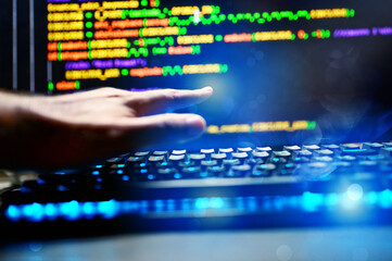 Wall Mural - computer of a programmer with lines code of software