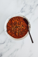 Wall Mural - vegan bolognese sauce with red lentils and textured vegetable protein, healthy plant-based food