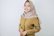 © Reezky - Happy government worker women standing confidance. PNS wearing khaki uniform.