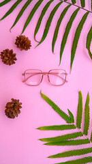 Wall Mural - square glasses in the photo in minimal summer style on a pastel pink background.