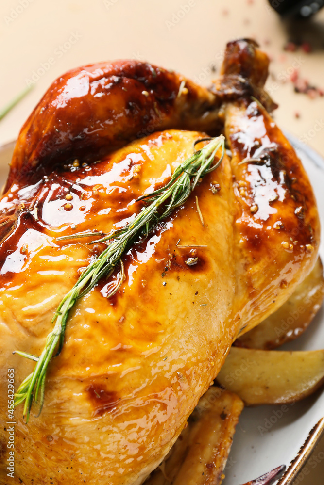 Plate with baked chicken and potato on color background, closeup