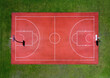 Red basketball court with marking lines
