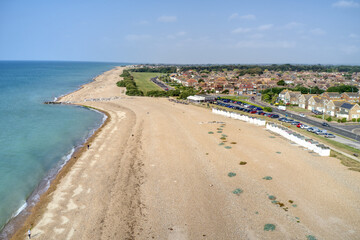 Poster - Goring by Sea beach with the Sea Lane Cafe in view and the greensward behind the beach at this popular seaside resort. Aerial photo.