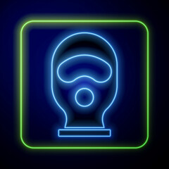 Canvas Print - Glowing neon Balaclava icon isolated on blue background. A piece of clothing for winter sports or a mask for a criminal or a thief. Vector