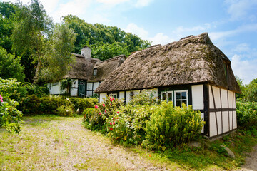 Beautiful Schlei region in Germany, Schleswig Holstein. German landscape in summer. Schlei river and typical houses with thatching, water reed roofs. Sieseby village