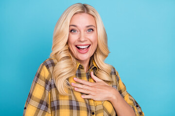 Sticker - Portrait of attractive cheerful wavy-haired woman impressed great news isolated over bright blue color background