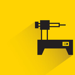 Wall Mural - industrial robot with shadow on yellow background