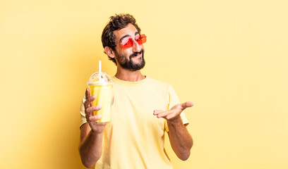 Wall Mural - expressive crazy man smiling happily with friendly and  offering and showing a concept