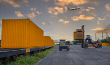 Transportation Logistics And Container Train Cargo And Cargo Plane Flying With Working Crane Forklift And Truck  In Railtrain Station With Transport Logistic Import And Export Business.