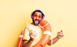expressive crazy bearded man wearing hat and sun glasses. hollidays concept
