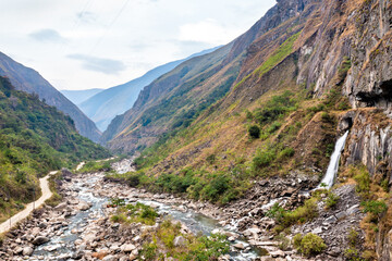 Wall Mural - Waterfall at the Urubamba river near Machu Picchu in Peru