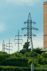 Poster - A row of electric poles with power lines.