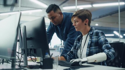 Aufkleber - Teamwork In Diverse Office: Smiling Project Manager Talks with Happy Woman with Disability with Prosthetic Arm to Work on Desktop Computer. Professionals Create e-Commerce Software App Solution
