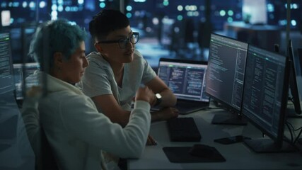 Poster - Teamwork In Diverse Office at Night: Project Manager Talks with Creative Solutions Specialist, They Discuss App Code Computer. Stylish Professionals Programming, Create e-Commerce Software