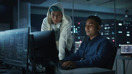 Poster - Teamwork In Diverse Office at Night: Project Manager Talks with Creative Solutions Specialist, They Discuss App Code Computer, Find Successful Solution and do High-Five in Celebration. Happy Employees