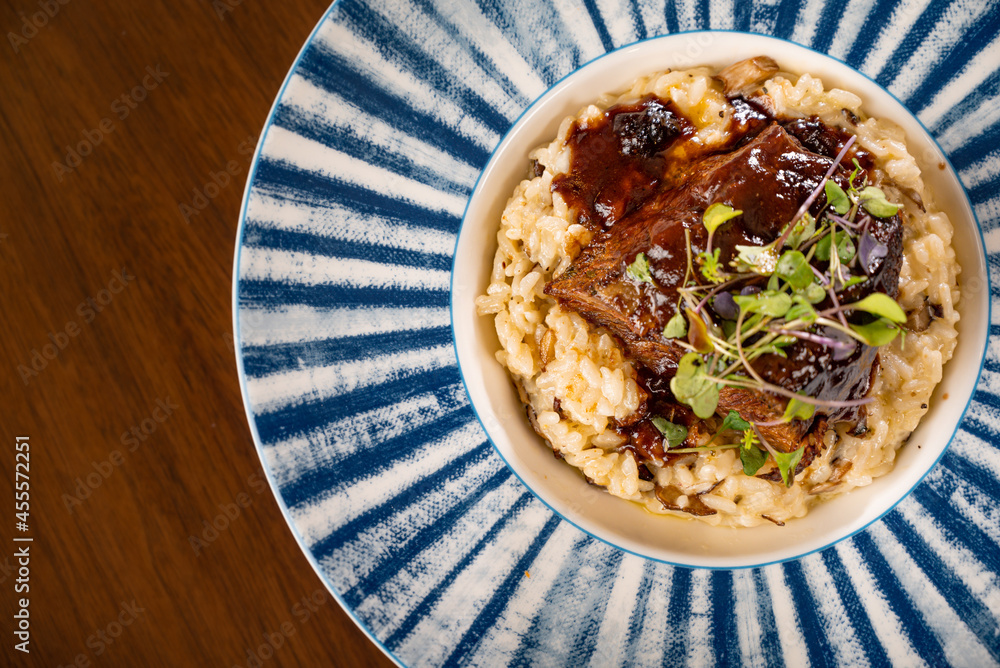 Slow Braised Beef Short Ribs over Wild Mushroom Risotto Stock Photo ...