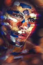 Blurred Close-up Of Face With Red, Blue And White Face Painting