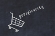 Chalk drawing of shopping cart and word perspicacity on black chalboard. Concept of globalization and mass consuming