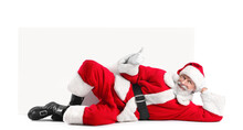 Lying Santa Claus With Blank Poster On White Background
