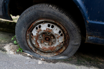 Sticker - Old rusty flat tire wheel