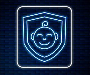 Wall Mural - Glowing neon line Baby on shield icon isolated on brick wall background. Child safety sign. Vector