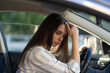 © DimaBerlin - Sad young woman suffer from stress inside car. Upset unhappy female driver sit on front seat pensive think of breakup, problem at work or study. Girl with pain from migraine or headache drive vehicle