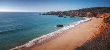 Atlantic Coast In Algarve, Portugal. Beautiful Bright Landscape, Waves And Rocks On The Beach
