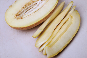 Sticker - fresh sliced melon on the table