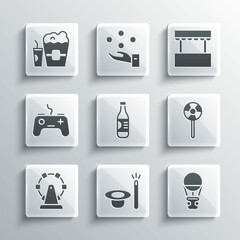 Sticker - Set Magic hat and wand, Hot air balloon, Lollipop, Bottle of water, Ferris wheel, Gamepad, Popcorn in box glass and Ticket office icon. Vector