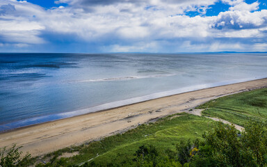 Wall Mural - View on Portneuf sur Mer sandbank from a nearby observation deck, in Cote Nord of Quebec, Canada