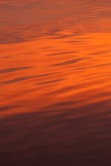 red reflection in water, metallic red water, abstract background