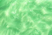 Green Water Aloe Vera Gel Smudged Texture. Abstract Clear Cosmetic Cream, Face Serum, Moisturizer Background