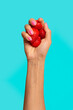 © Kellie - Hand holding strawberries