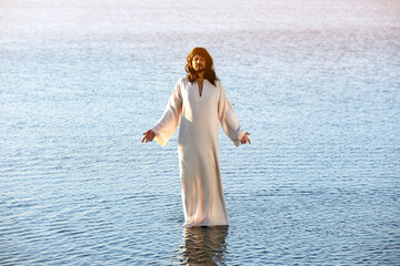 Poster - Jesus Christ in water lit by morning sun