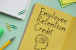 © Andrii - Employee Retention Credit ERC is shown on the business photo using the text