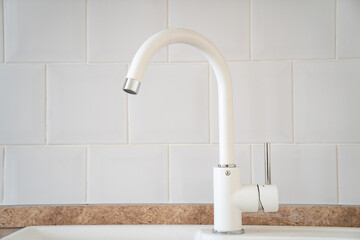 Wall Mural - white sink and kitchen faucet. plumbing for home