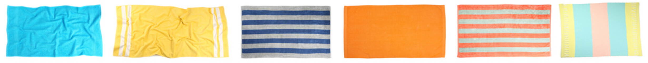 Set with different beach towels on white background, top view. Banner design