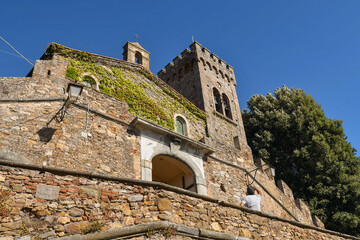 Wall Mural - Low-angle view of the Castle of Castagneto Carducci, built by the Counts of Gherardesca in the year 1000, belongs to the family for 34 generations