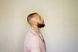 © Eloisa Ramos/Stocksy - Portrait of modern man with beard in profile