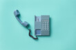 © Yaroslav Danylchenko/Stocksy - Blue telephone handset
