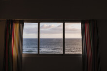 View Of Sea Through Window