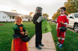 © Jessica Klaus/Stocksy - Scenes from around the city on Halloween night.
